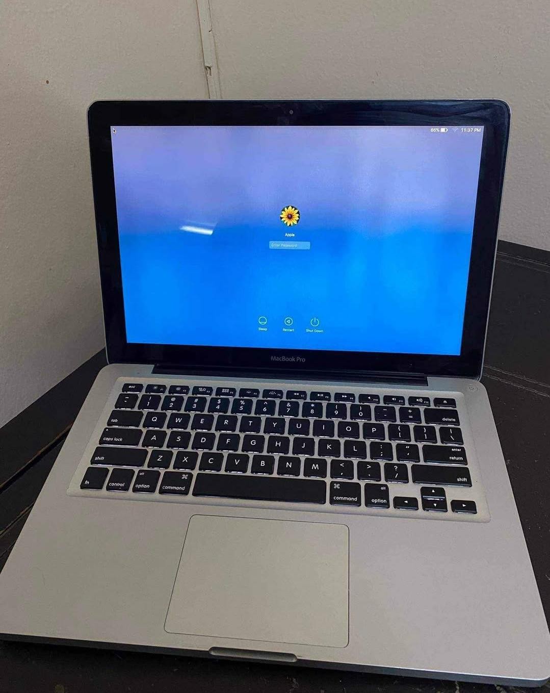 Super clean macbook pro 2011 core i5 4gb ram 640gb rom with keyboard light and long lasting battery