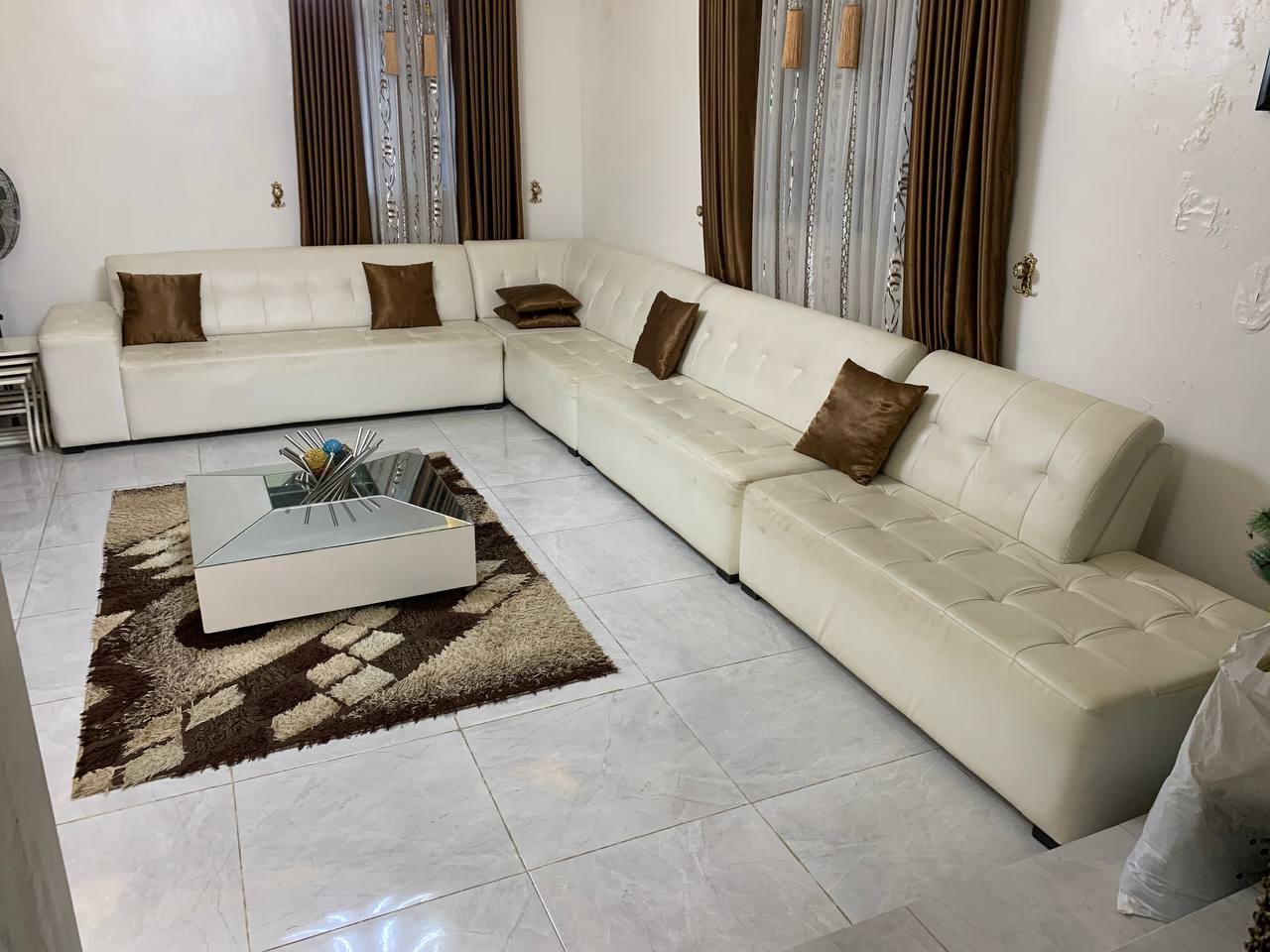 ❌❌SOLD-OUT❌❌...Clean White 10 Seater Leather Chairs with a center table Forsale