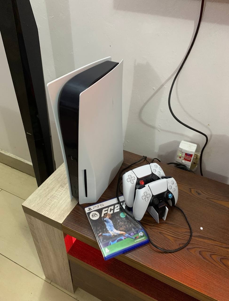 PlayStation 5 with 5Installed Games, FC24 CD & Pad Charger