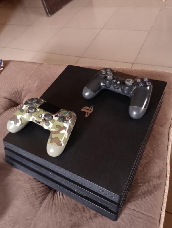 ❌❌SOLD-OUT❌❌  V.Clean PlayStation Pro With 6 Different Installed Games (Mortal combat, Fifa 24, Formula 1, 2016 Call of duty, Need for speed,   Rocket and more) With 2 Pads For-Sale