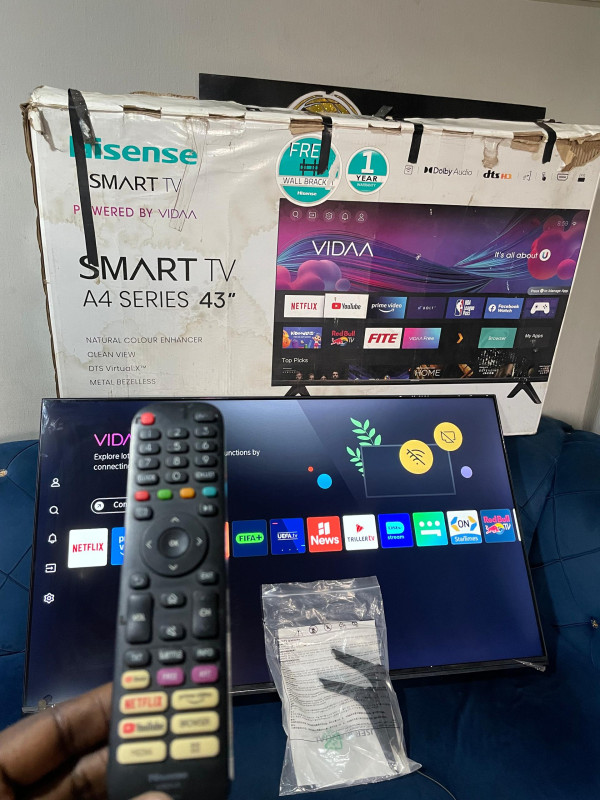 VERY CLEAN 43 INCHES HISENSE FRAMELESS SMART TV WITH CARTON AND ACCESSORIES